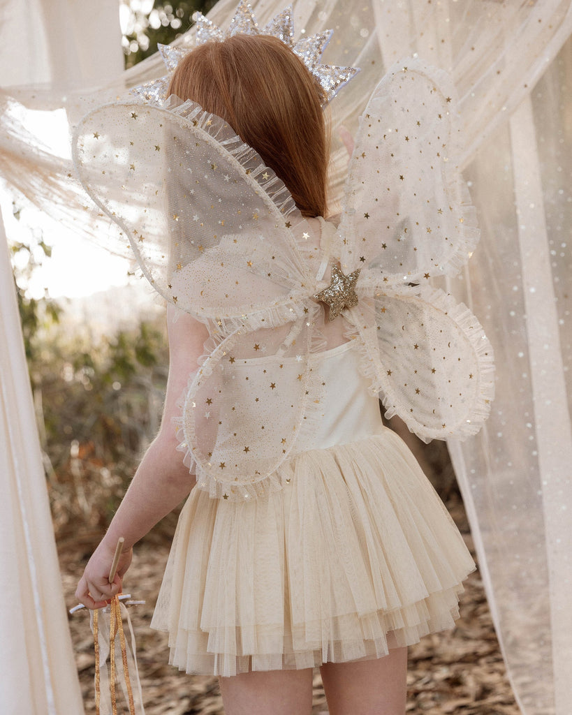 Wings in Champagne Stars by Noralee