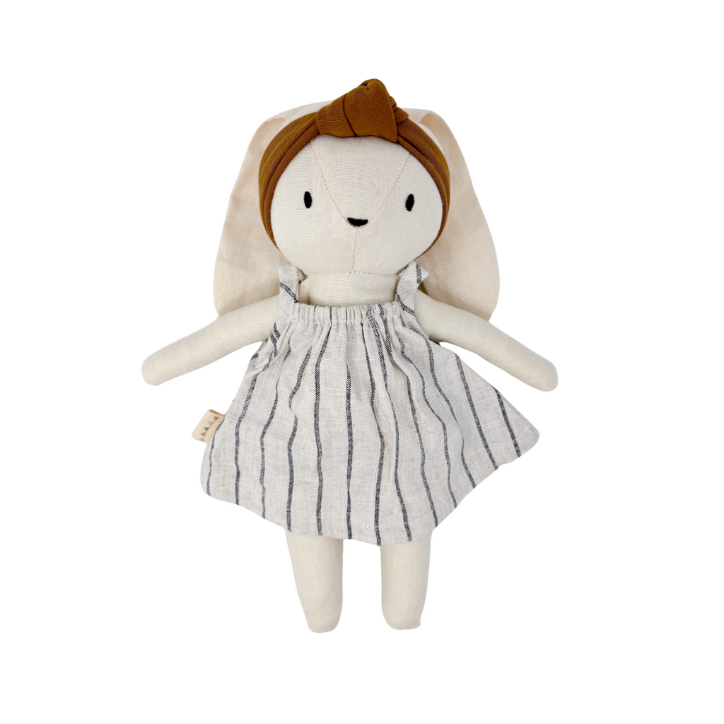 Bunny Doll wearing brown head band and stripe dress