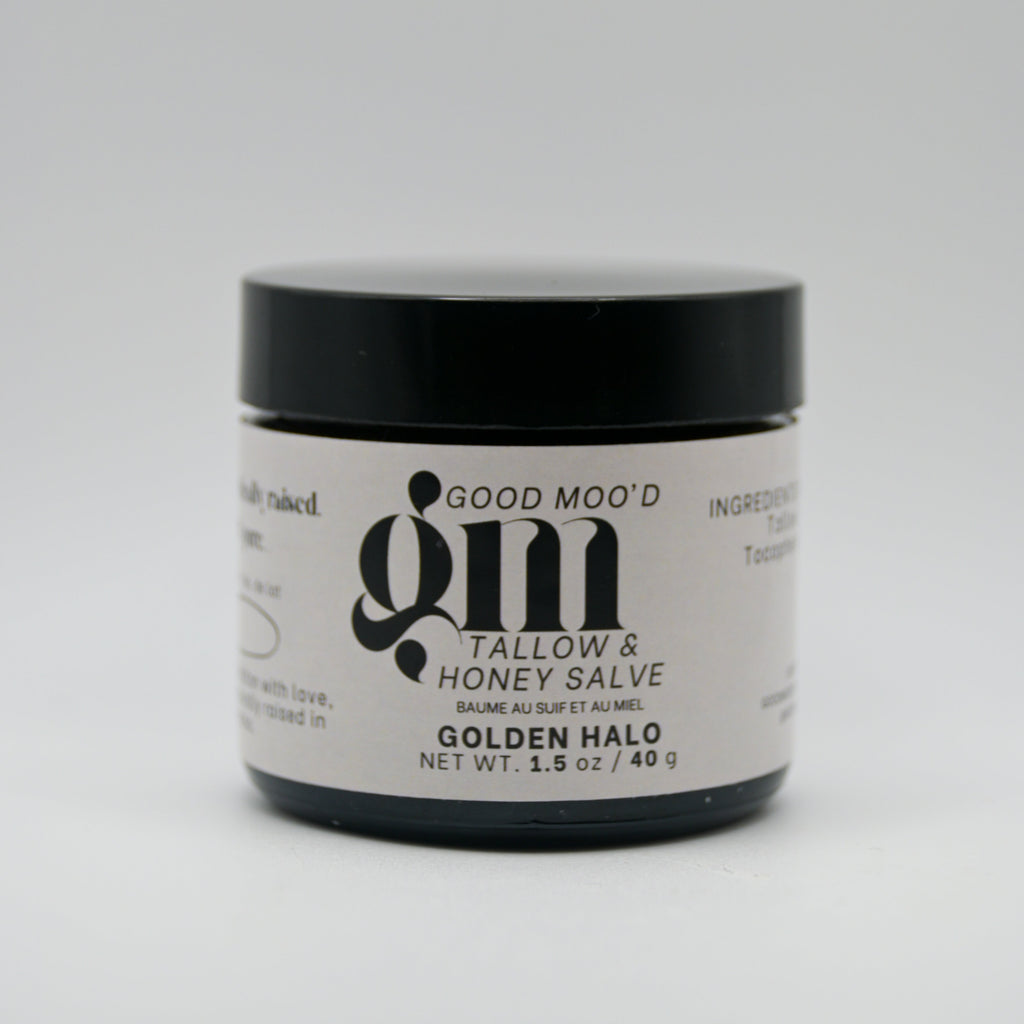 Jar of Good Mo' D tallow and honey salve on a white background