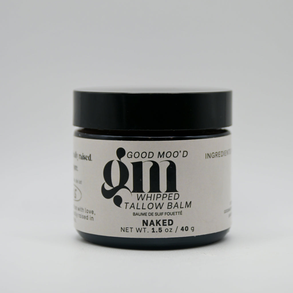 Jar of 'Good Mo'od' whipped tallow balm on a white background