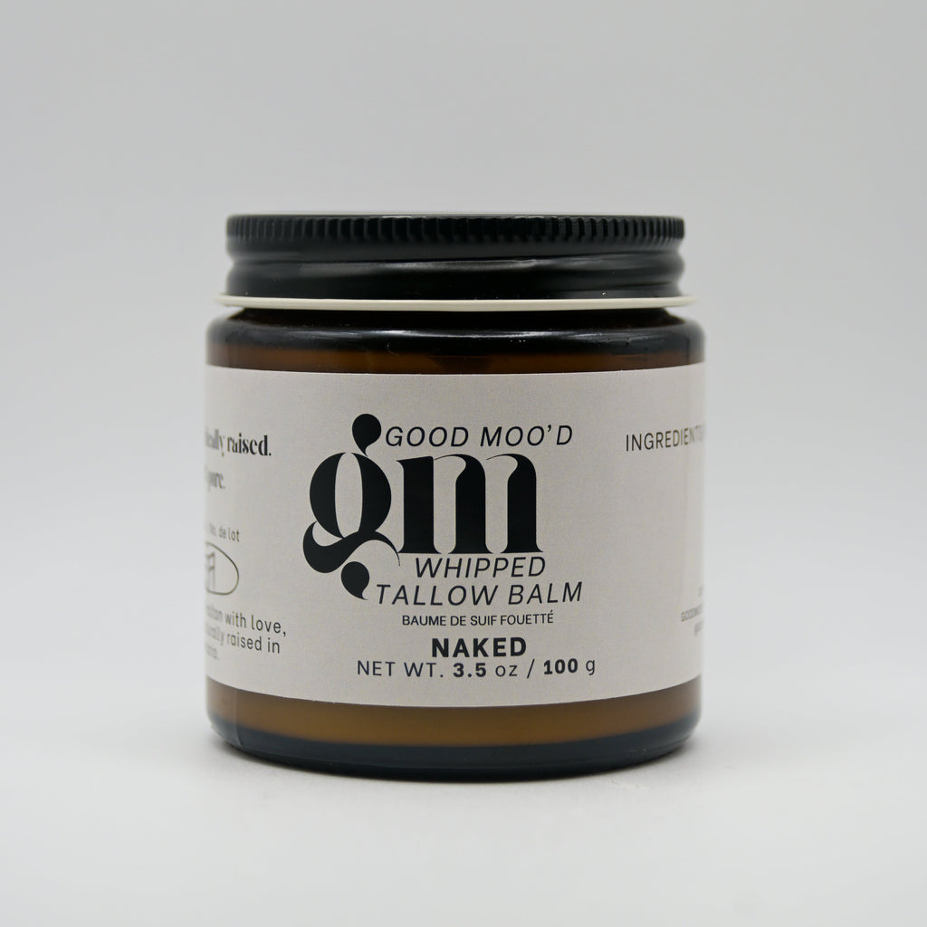 Jar of Good Moo'd whipped tallow balm on a white background