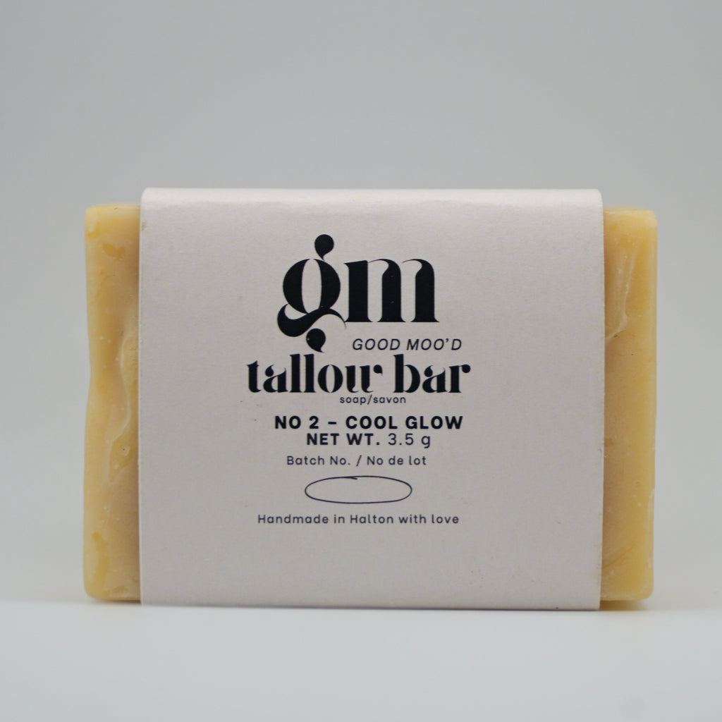 Bar of soap with a label on a gray background
