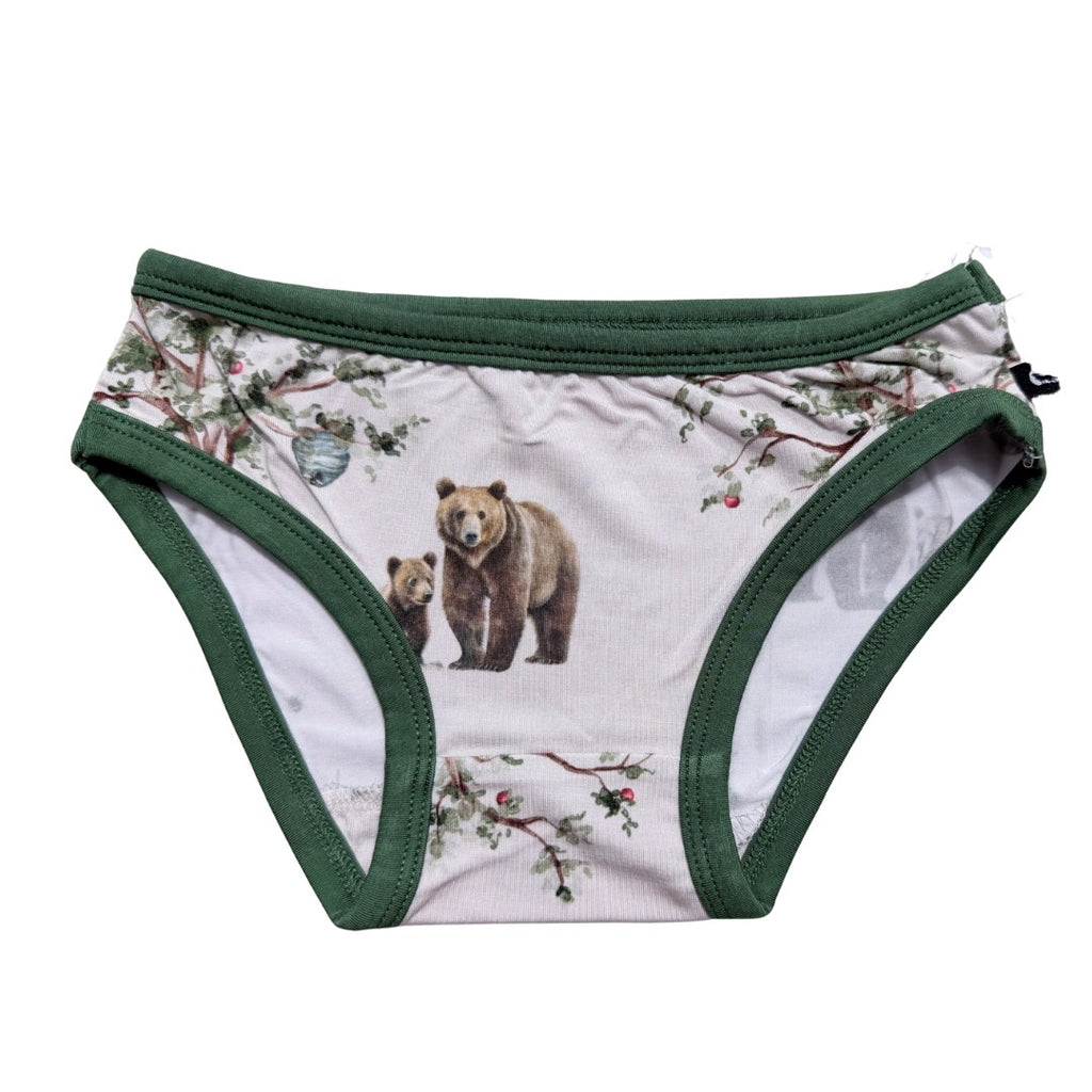 Beige and green underwear with bears flat lay