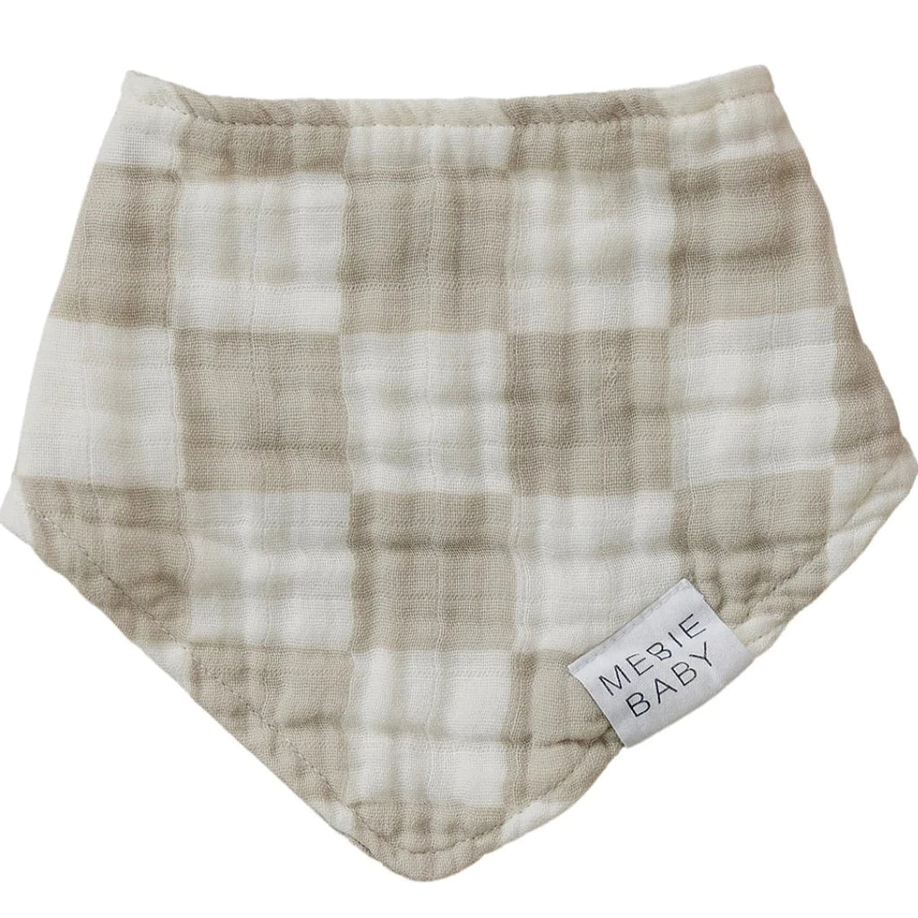 Taupe Checkered Bib by Mebie Baby muslin soft drool bib for babies flat lay against white background