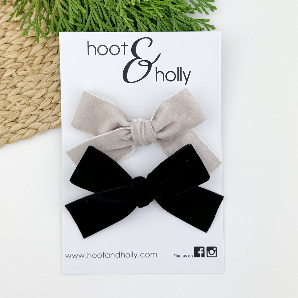 Grey and black velvet bows flat lay