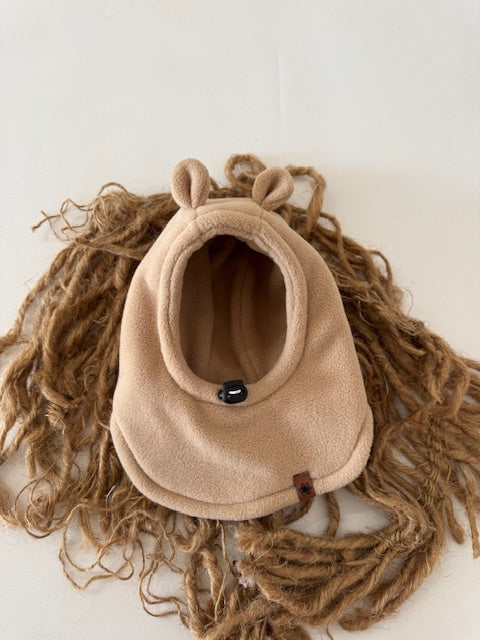 Brown Bear hat on wool flat lay