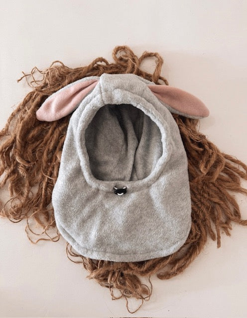 grey bunny hat and brown wool flat lay