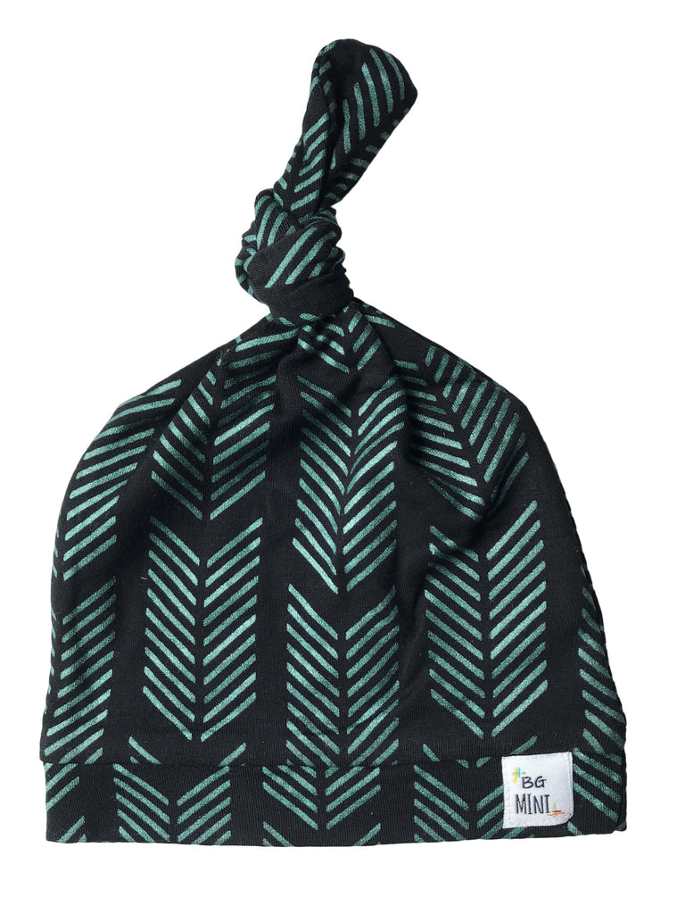 Green & Black top knot hat flat lay