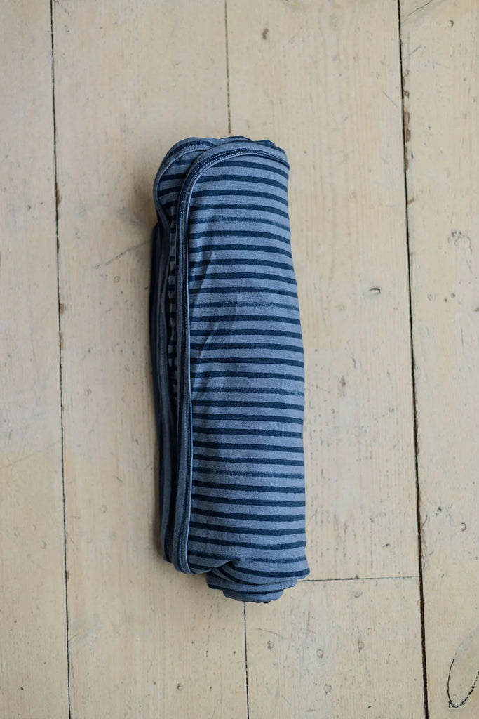 Blue stripe swaddle blanket flat lay